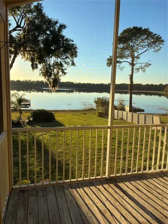 a view of a balcony with a ocean view