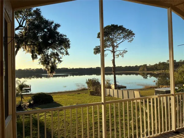a view of a lake from a balcony