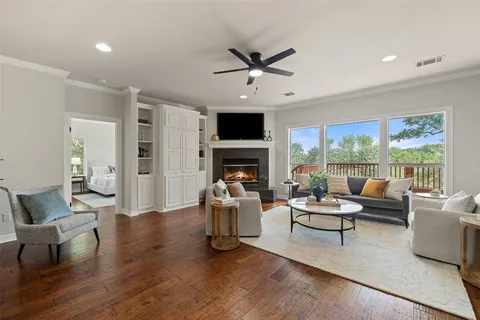 a large kitchen with a table and chairs