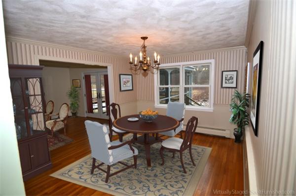 43 Jacob Gates Road Harvard, MA 01451 - Photo 2 of 17 a view of a dining room with furniture and chandelier