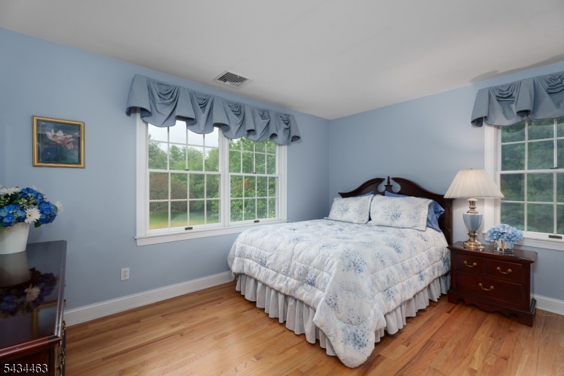 110 Orchard Road Skillman, NJ 08558 - Photo 28 of 43 a bedroom with a bed and a window
