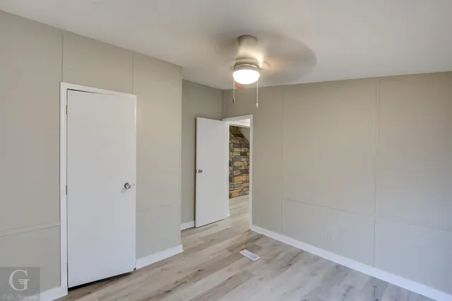 a bathroom with a toilet a sink and bathtub