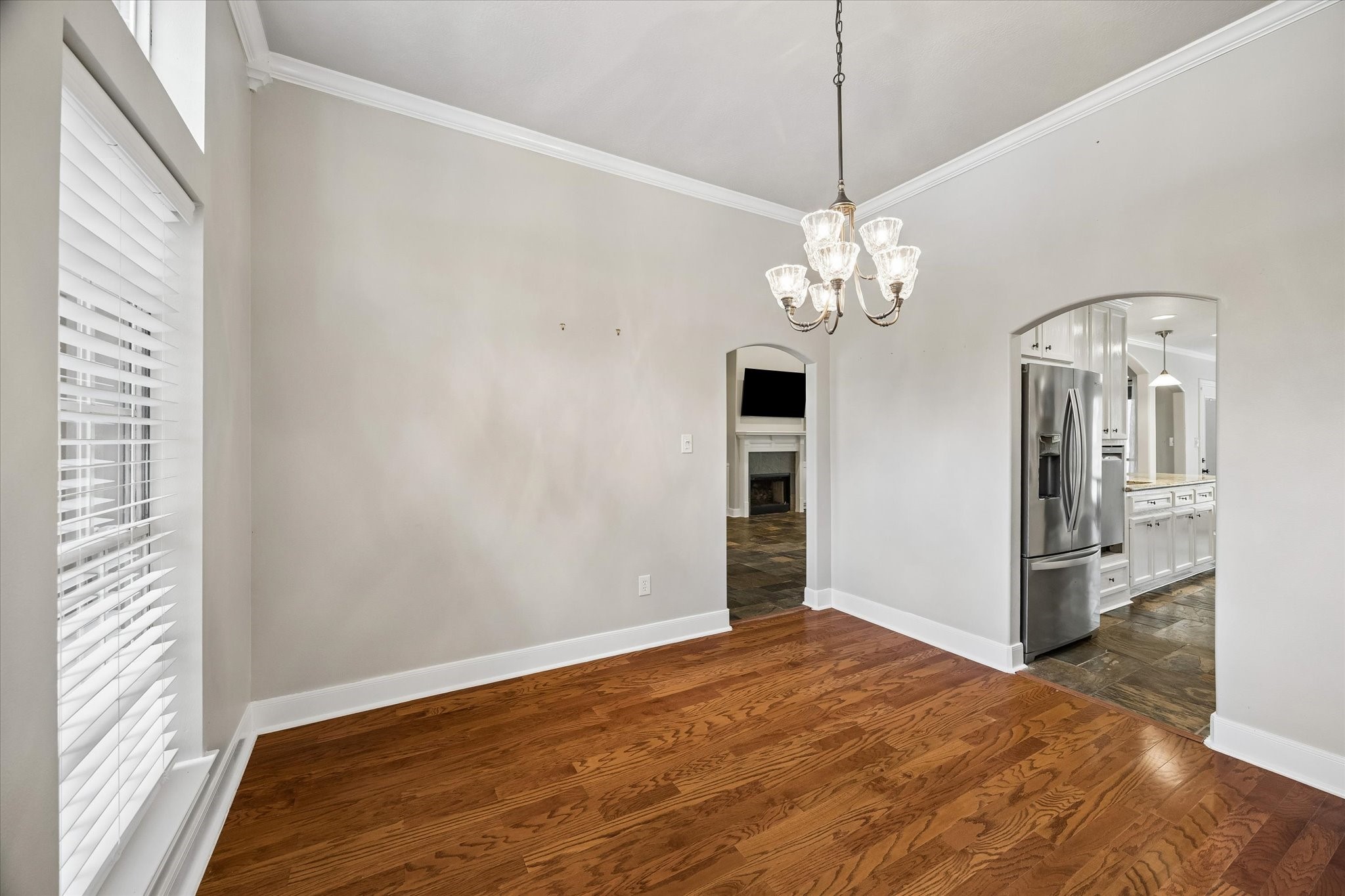 109 Dawns Edge Conroe, TX 77356 - Photo 9 of 24 a view of a livingroom with a chandelier