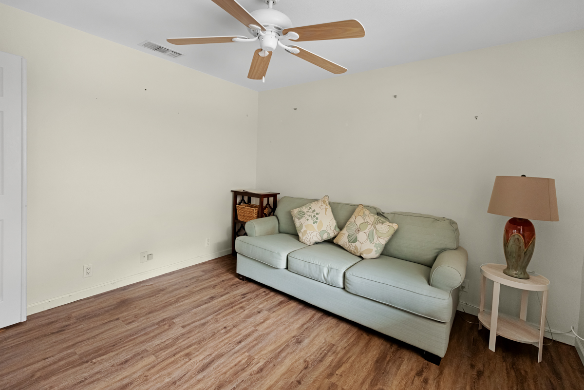 77-6596 Walua Road Kailua-Kona, HI 96740 - Photo 12 of 20 a living room with furniture and a wooden floor