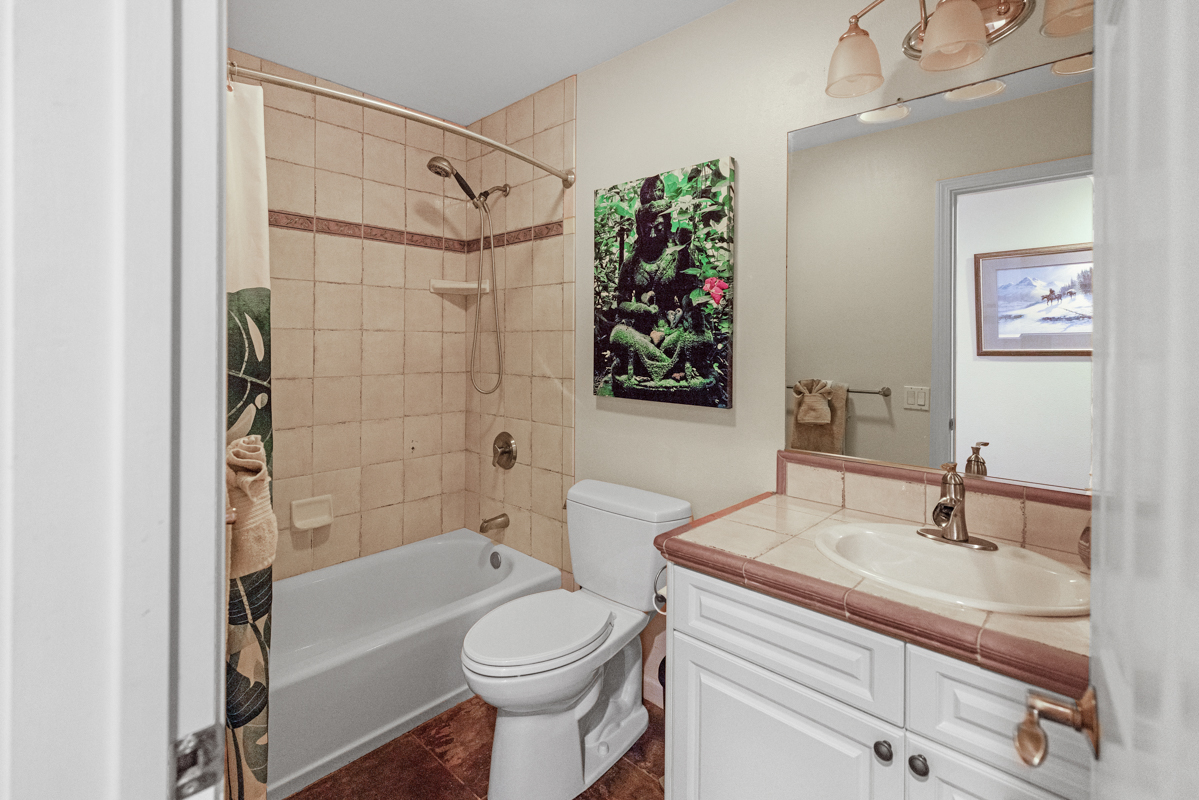 77-6596 Walua Road Kailua-Kona, HI 96740 - Photo 17 of 20 a bathroom with a sink a toilet and shower