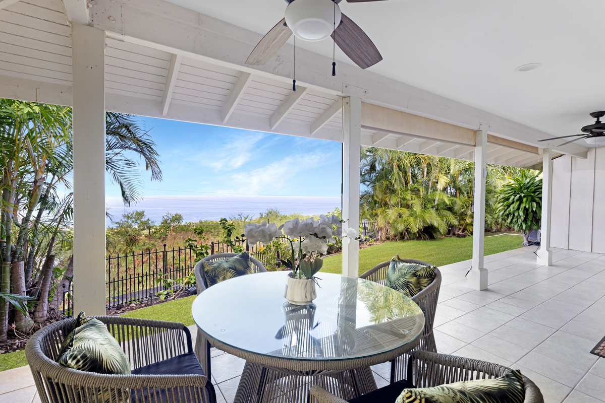 77-6596 Walua Road Kailua-Kona, HI 96740 - Photo 2 of 20 a balcony with furniture and a potted plant