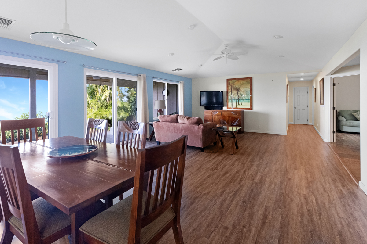 77-6596 Walua Road Kailua-Kona, HI 96740 - Photo 5 of 20 a view of a dining room with furniture window and wooden floor