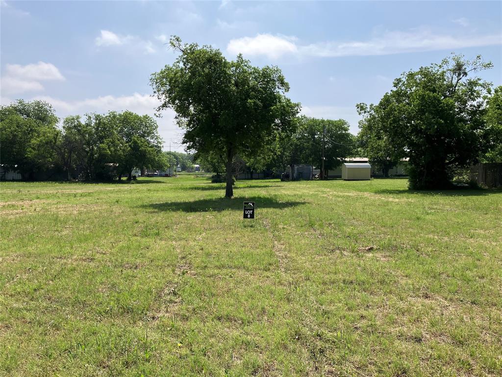 0 Hawk Street Dublin, TX 76446 - Photo 7 of 26 a big yard with lots of green space and house in the background