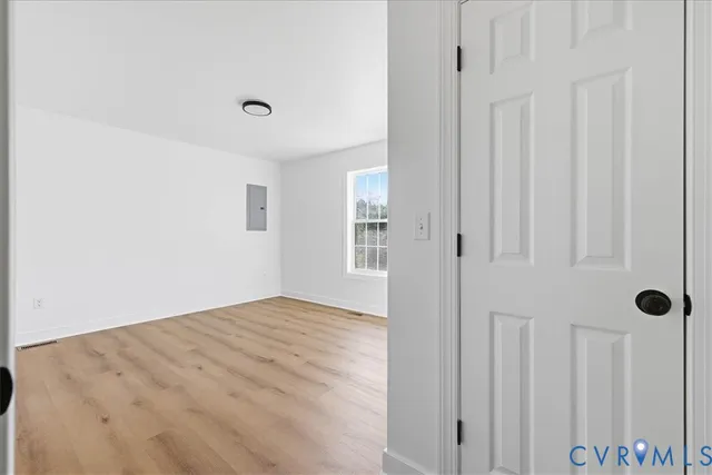 a view of a livingroom with wooden floor