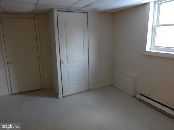905 Wagontown Road Coatesville, PA 19320 - Photo 11 of 11 an empty room with windows