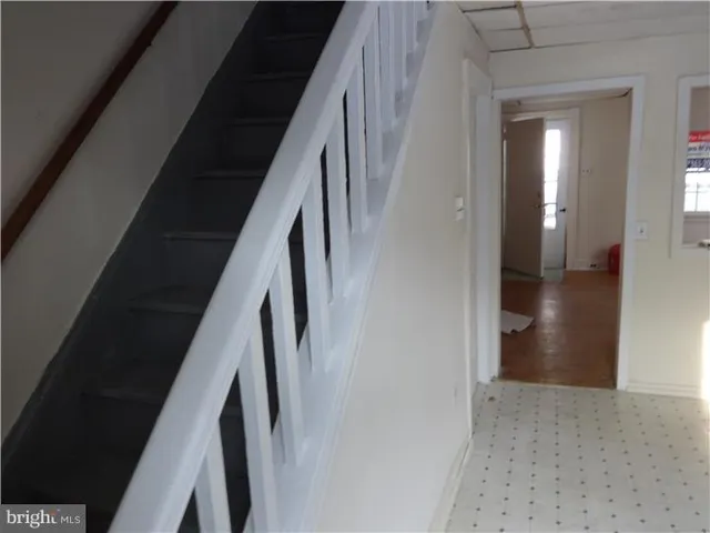 a view of hallway with stairs