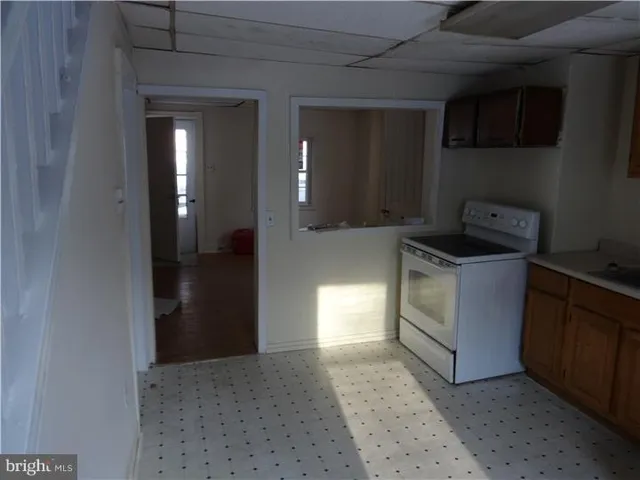 a view of a kitchen with a sink