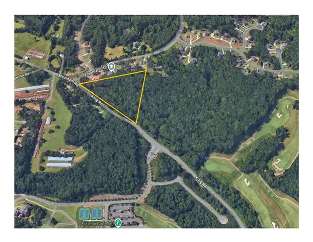 a view of a house with a park