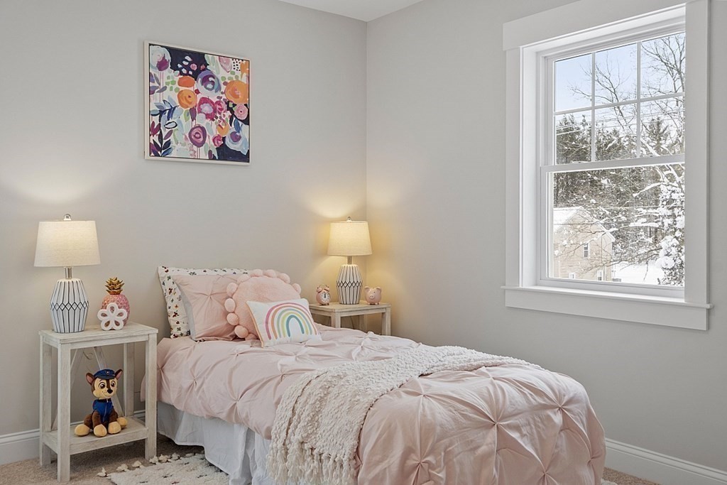 145 New Estate Road Littleton, MA 01460 - Photo 28 of 41 a bedroom with a bed and a window