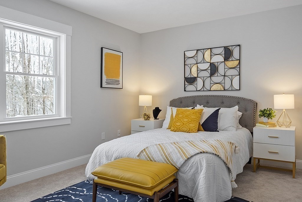 145 New Estate Road Littleton, MA 01460 - Photo 32 of 41 a bedroom with a bed and a window