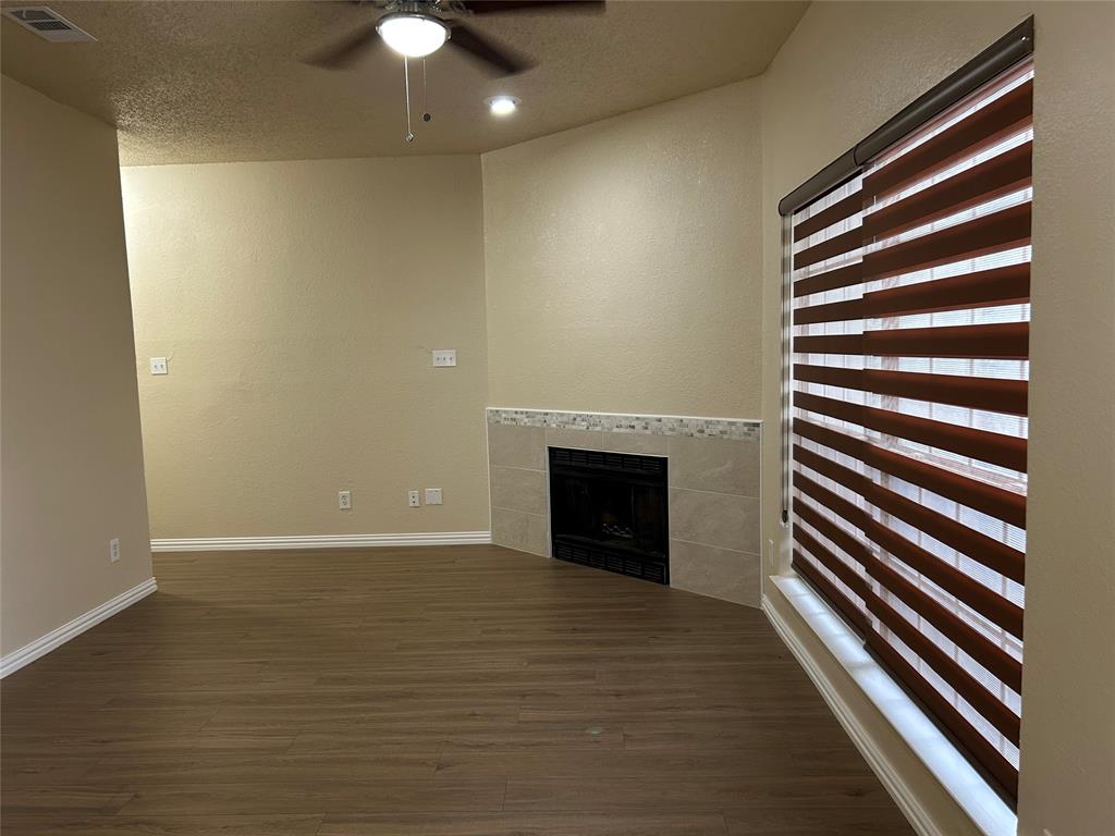 4101 Esters Road, Unit 103 Irving, TX 75038 - Photo 2 of 14 a view of a livingroom with a fireplace