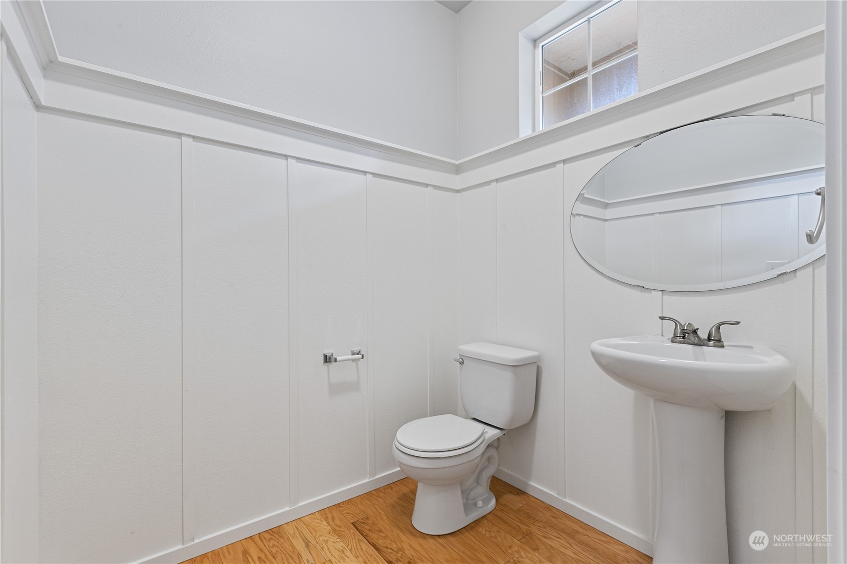 20734 76th Avenue West, Unit D Edmonds, WA 98026 - Photo 14 of 32 a bathroom with a toilet sink and mirror
