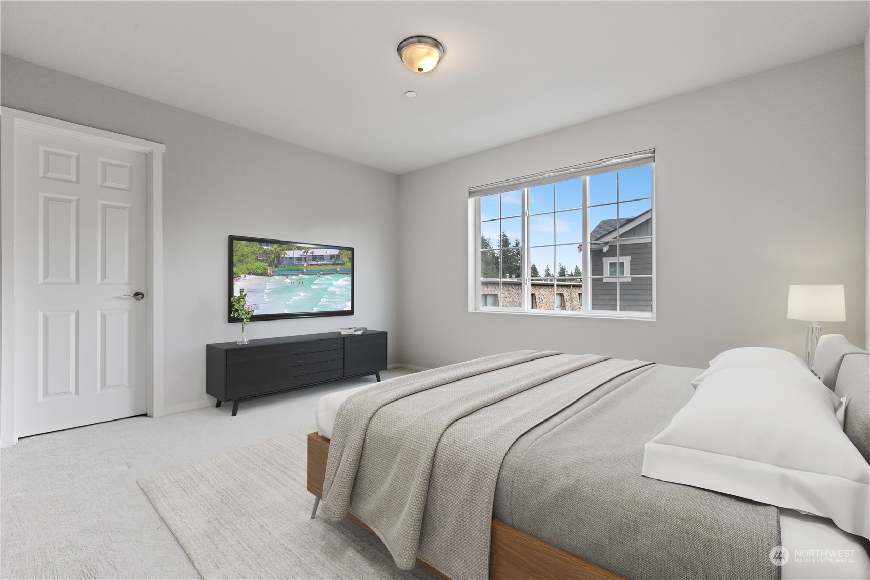 20734 76th Avenue West, Unit D Edmonds, WA 98026 - Photo 23 of 32 a bedroom with a bed and a window