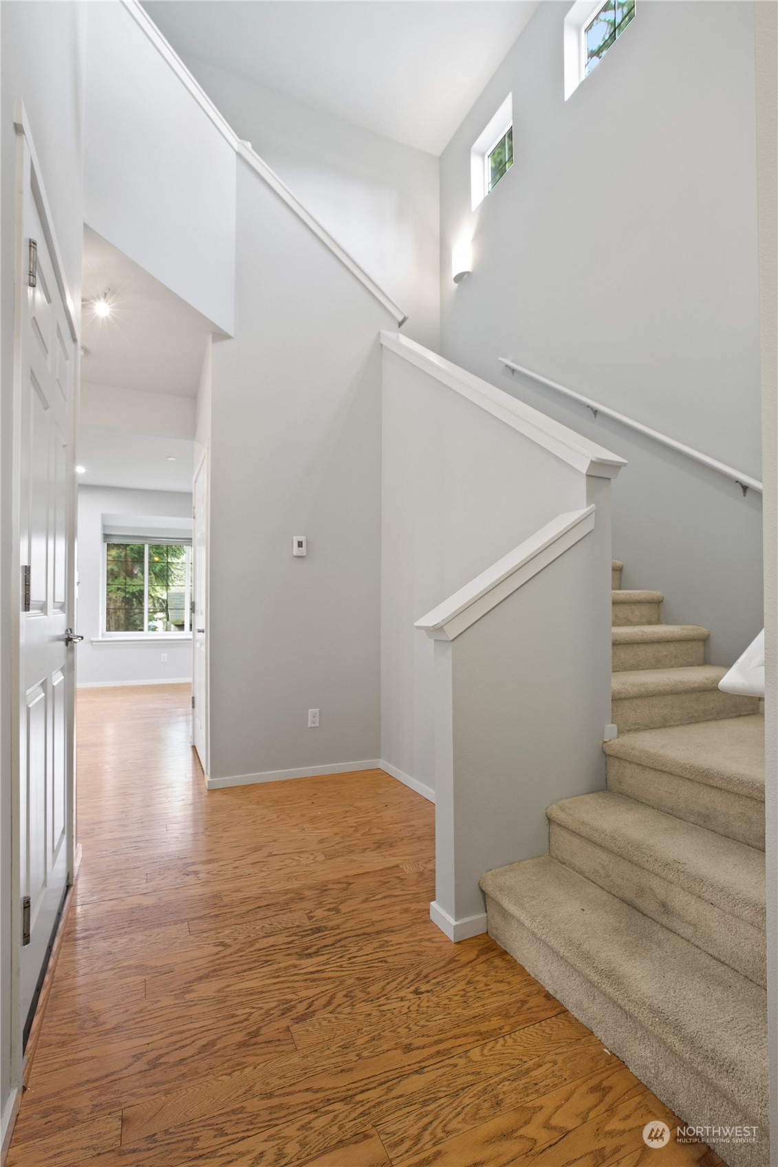 20734 76th Avenue West, Unit D Edmonds, WA 98026 - Photo 4 of 32 a view of entryway with wooden floor