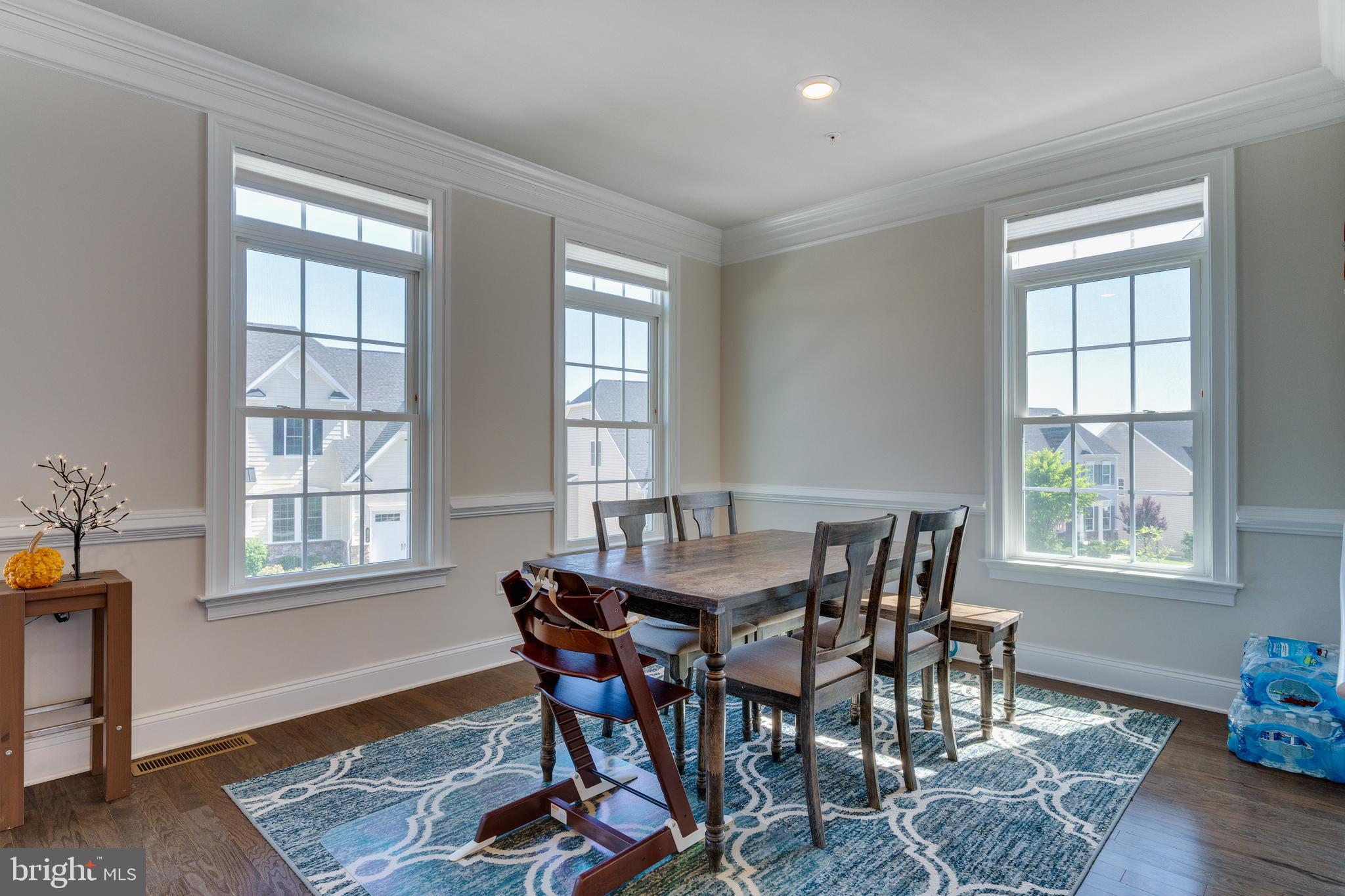 837 Stonecliffe Road Malvern, PA 19355 - Photo 8 of 12 a view of a dining room with furniture and wooden floor