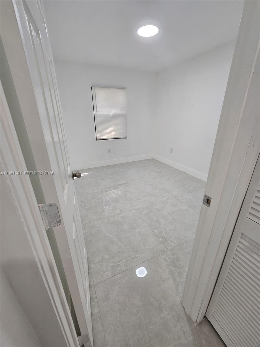1148 Northwest 100th Street, Unit 2 Miami, FL 33150 - Photo 11 of 22 a view of a small space