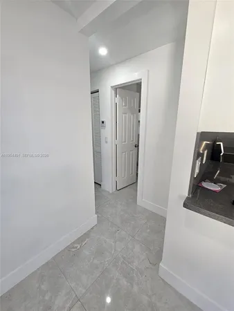 a view of a sink and a mirror