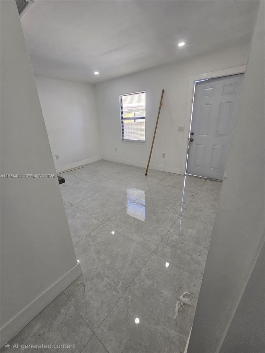 1148 Northwest 100th Street, Unit 2 Miami, FL 33150 - Photo 7 of 22 a view of a hallway