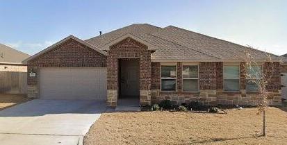 2633 Old Ironsides Road Abilene, TX 79601 - Photo 1 of 1 a front view of a house with a yard