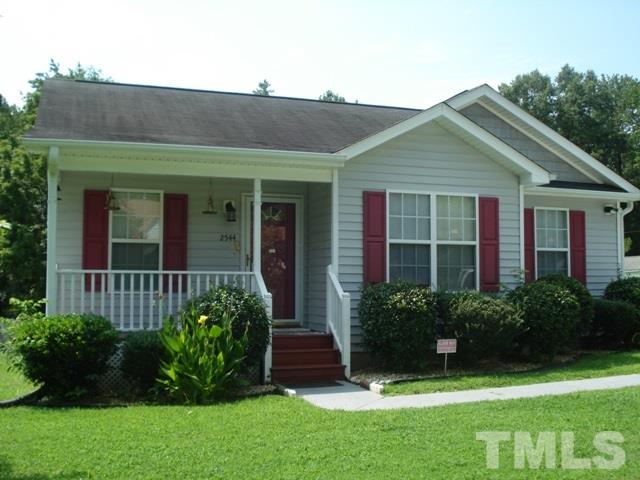 2544 Ross Road Durham, NC 27703 - Photo 1 of 15 a front view of a house with a yard