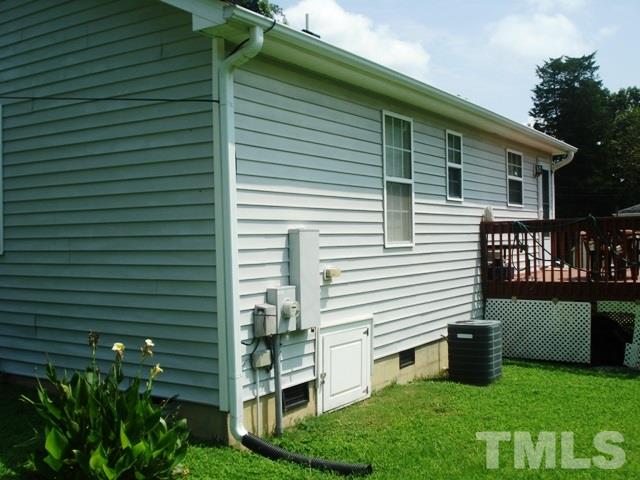 2544 Ross Road Durham, NC 27703 - Photo 3 of 15 a front view of a house with garden