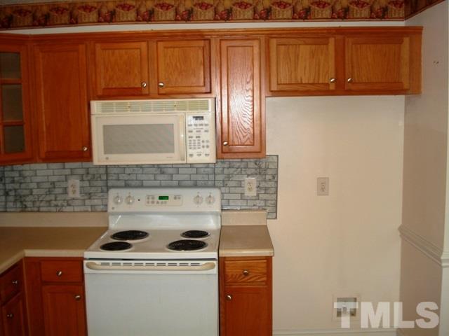 2544 Ross Road Durham, NC 27703 - Photo 8 of 15 a kitchen with a sink and a microwave