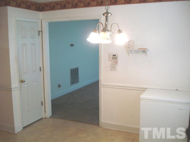 2544 Ross Road Durham, NC 27703 - Photo 10 of 15 a view of a bathroom with a shower and a toilet