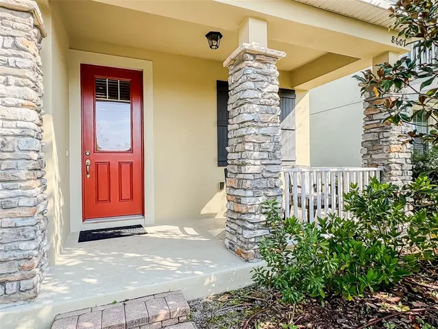 a kitchen with granite countertop a sink stainless steel appliances and cabinets