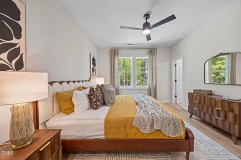 a living room with furniture rug and window