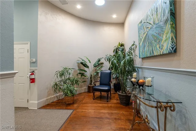 a workspace with furniture and window