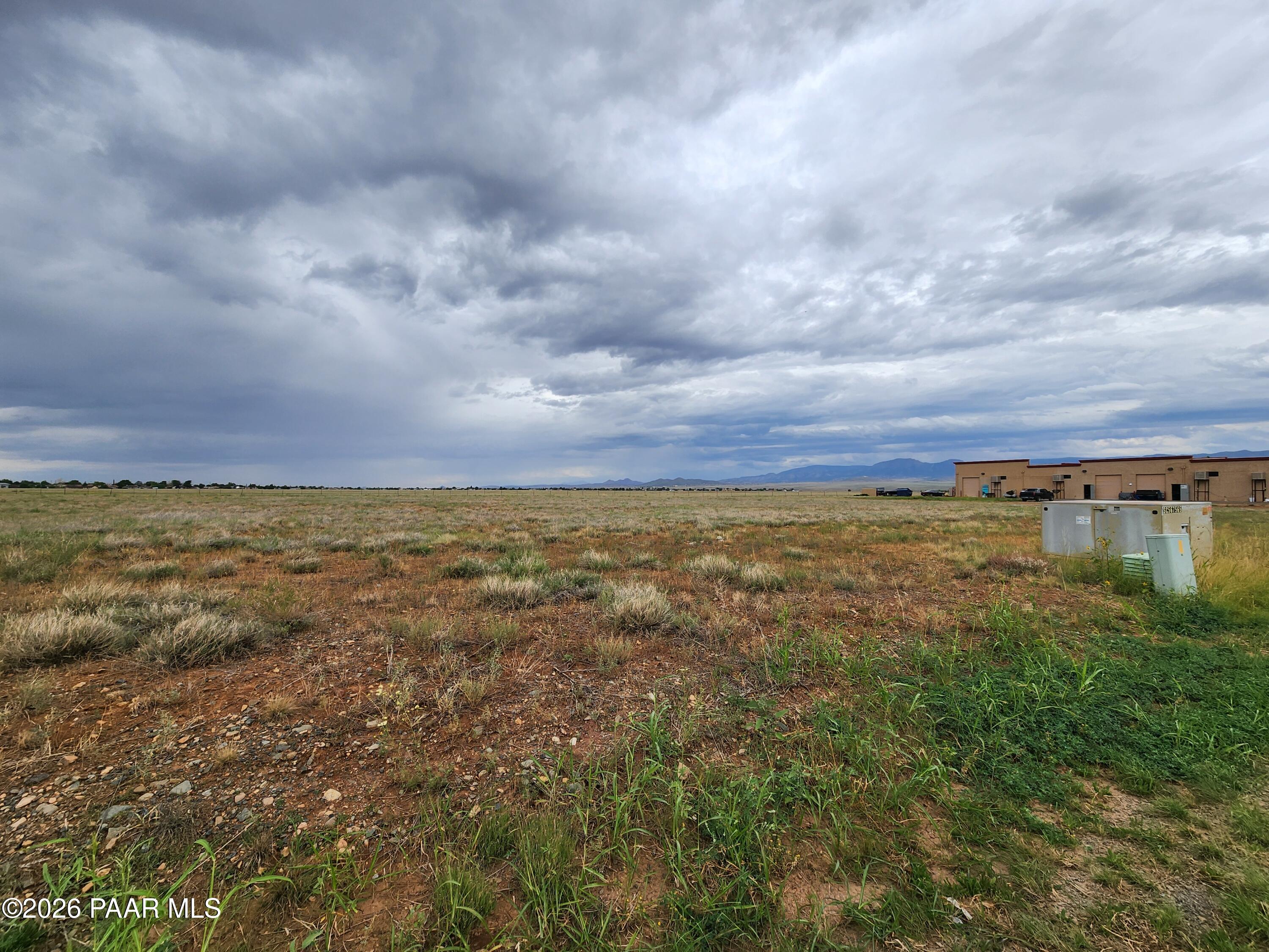 0 Florentine Road Prescott Valley, AZ 86314 - Photo 5 of 6 an aerial view of residential houses with outdoor space