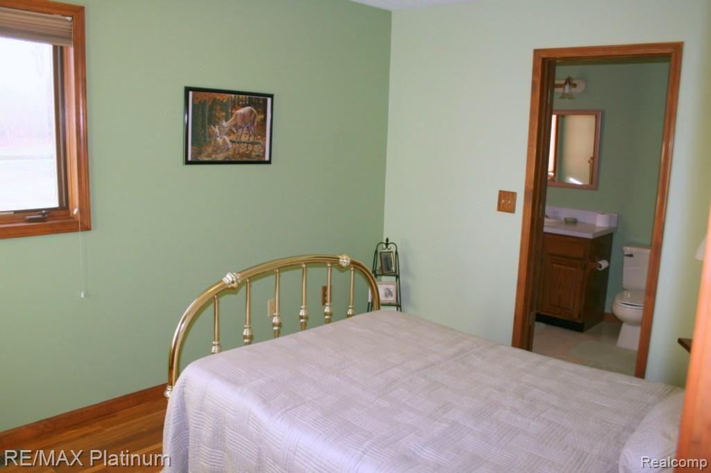 6427 East Clyde Road Howell, MI 48855 - Photo 21 of 34 2nd Bedroom with private full bath