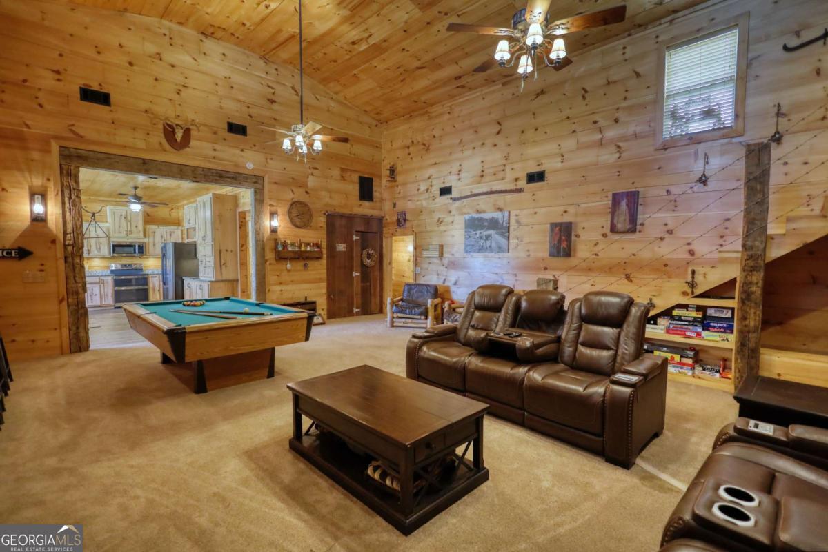 947 Bellhouse Road Macon, GA 31217 - Photo 16 of 100 a living room with furniture and a flat screen tv