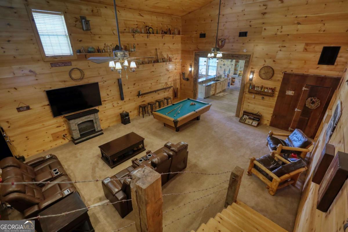 947 Bellhouse Road Macon, GA 31217 - Photo 38 of 100 a room with furniture and a flat screen tv