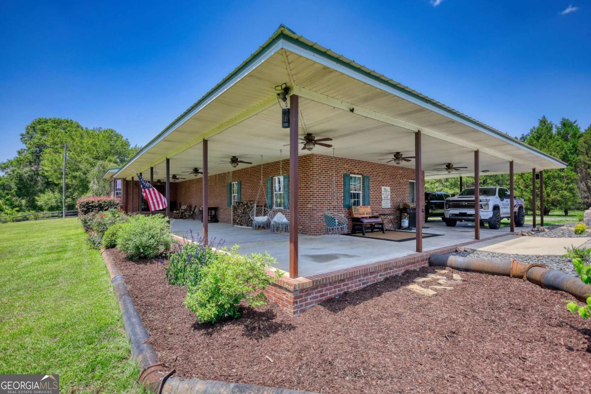 947 Bellhouse Road Macon, GA 31217 - Photo 44 of 100 a front view of a house with a yard