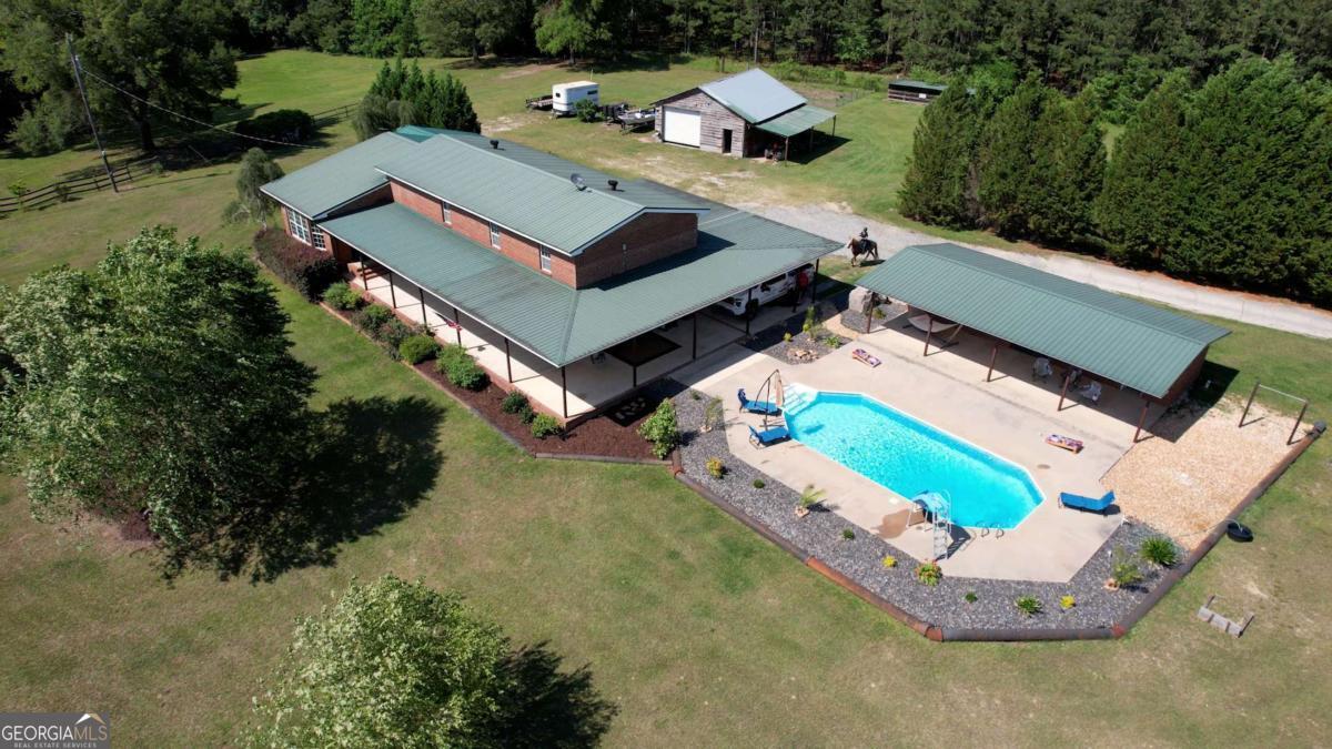 947 Bellhouse Road Macon, GA 31217 - Photo 52 of 100 an aerial view of a house with a garden