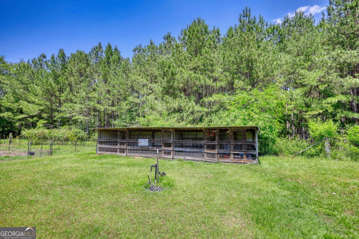 947 Bellhouse Road Macon, GA 31217 - Photo 68 of 100 a front view of a house with a yard