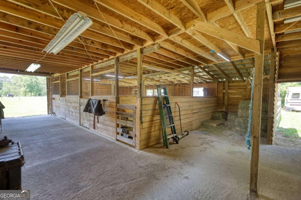 947 Bellhouse Road Macon, GA 31217 - Photo 76 of 100 a view of a room with wooden walls