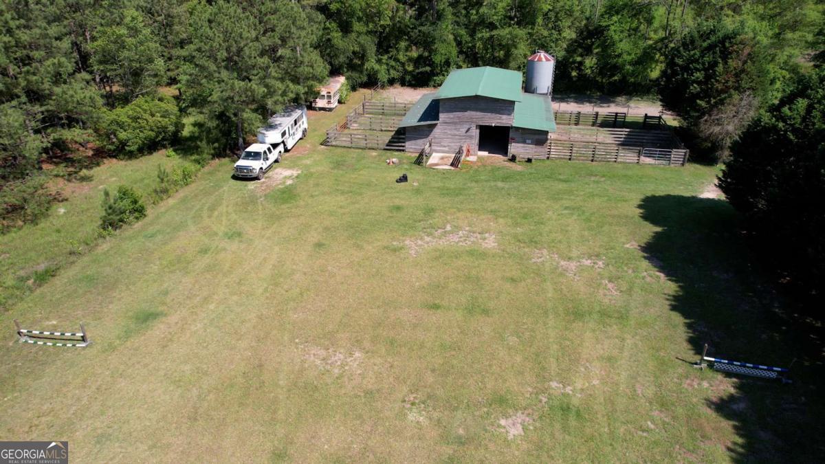 947 Bellhouse Road Macon, GA 31217 - Photo 82 of 100 a house with swimming pool in front of it