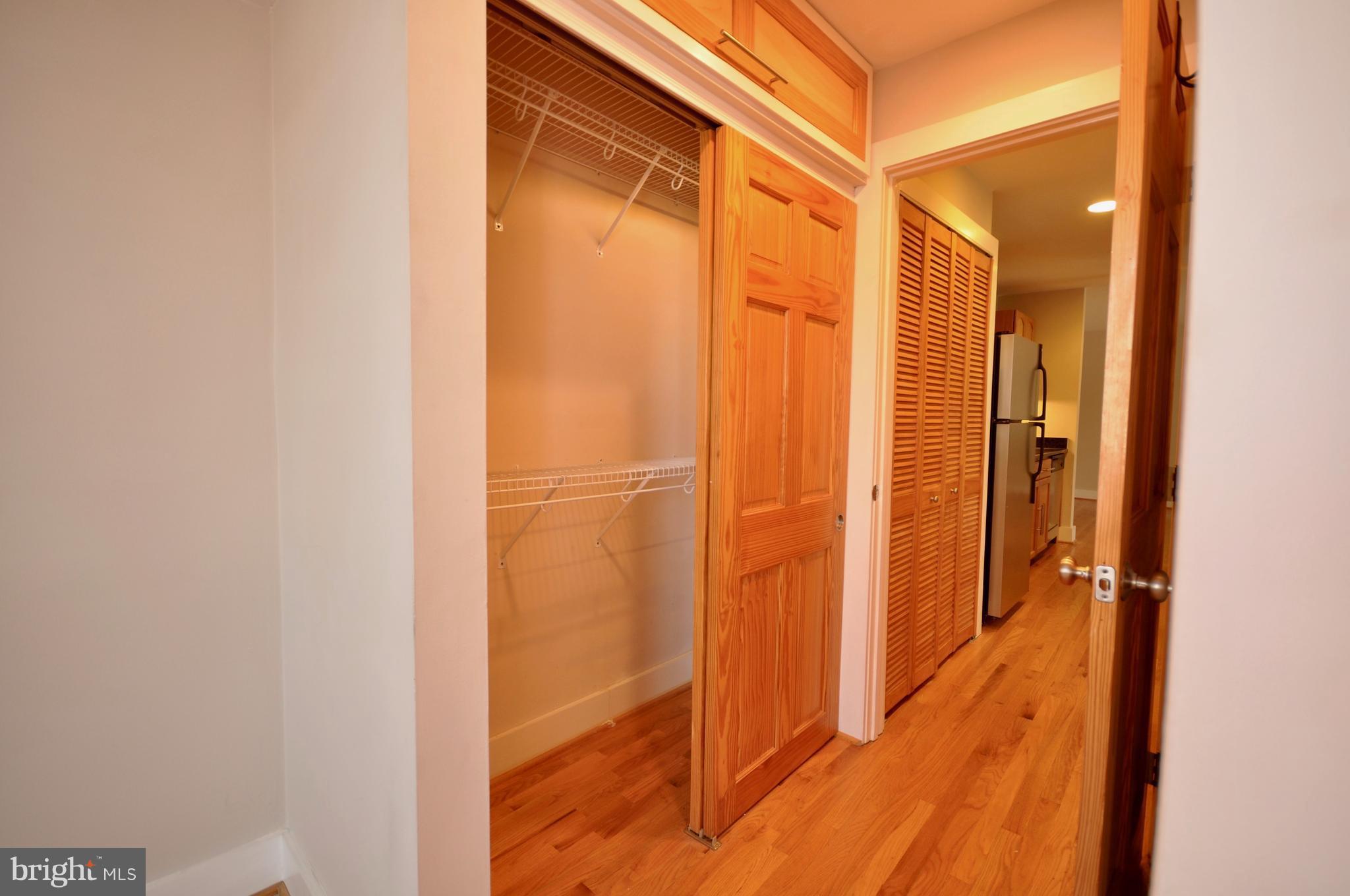 32 West Montgomery Street, Unit R8 Baltimore, MD 21230 - Photo 18 of 25 Double Rods in Closet and Storage Above