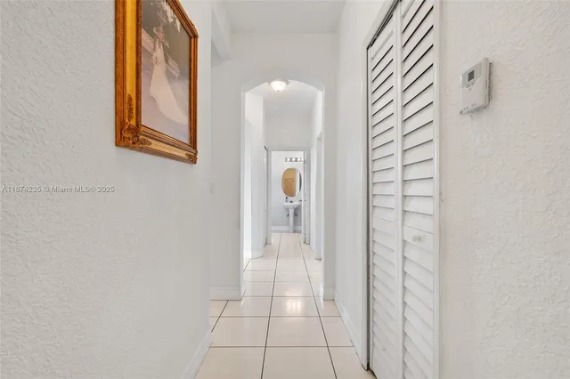 a bathroom with a toilet a sink and bathtub