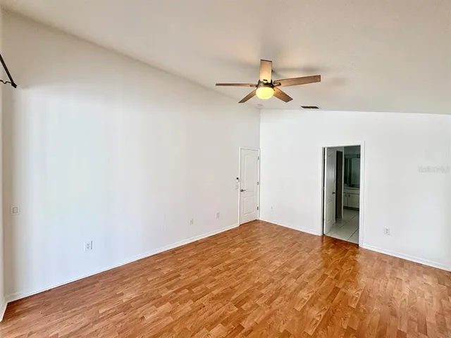 a view of a big room with carpet