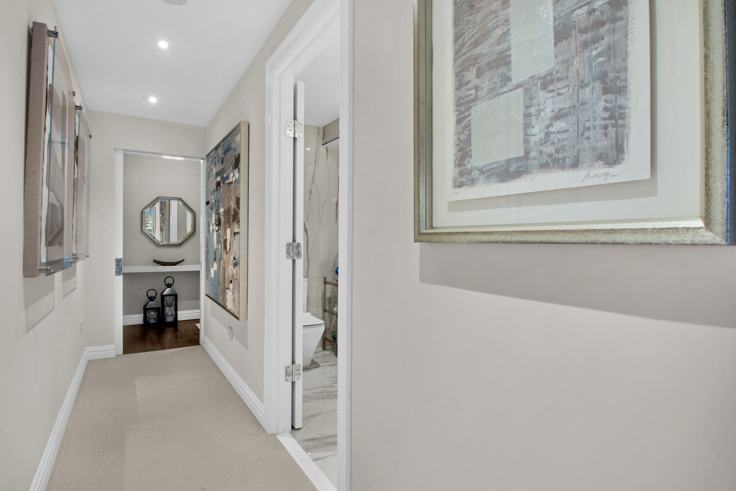 241 East 76th Street, Unit 2HI Manhattan, NY 10021 - Photo 18 of 27 a view of a hallway with windows