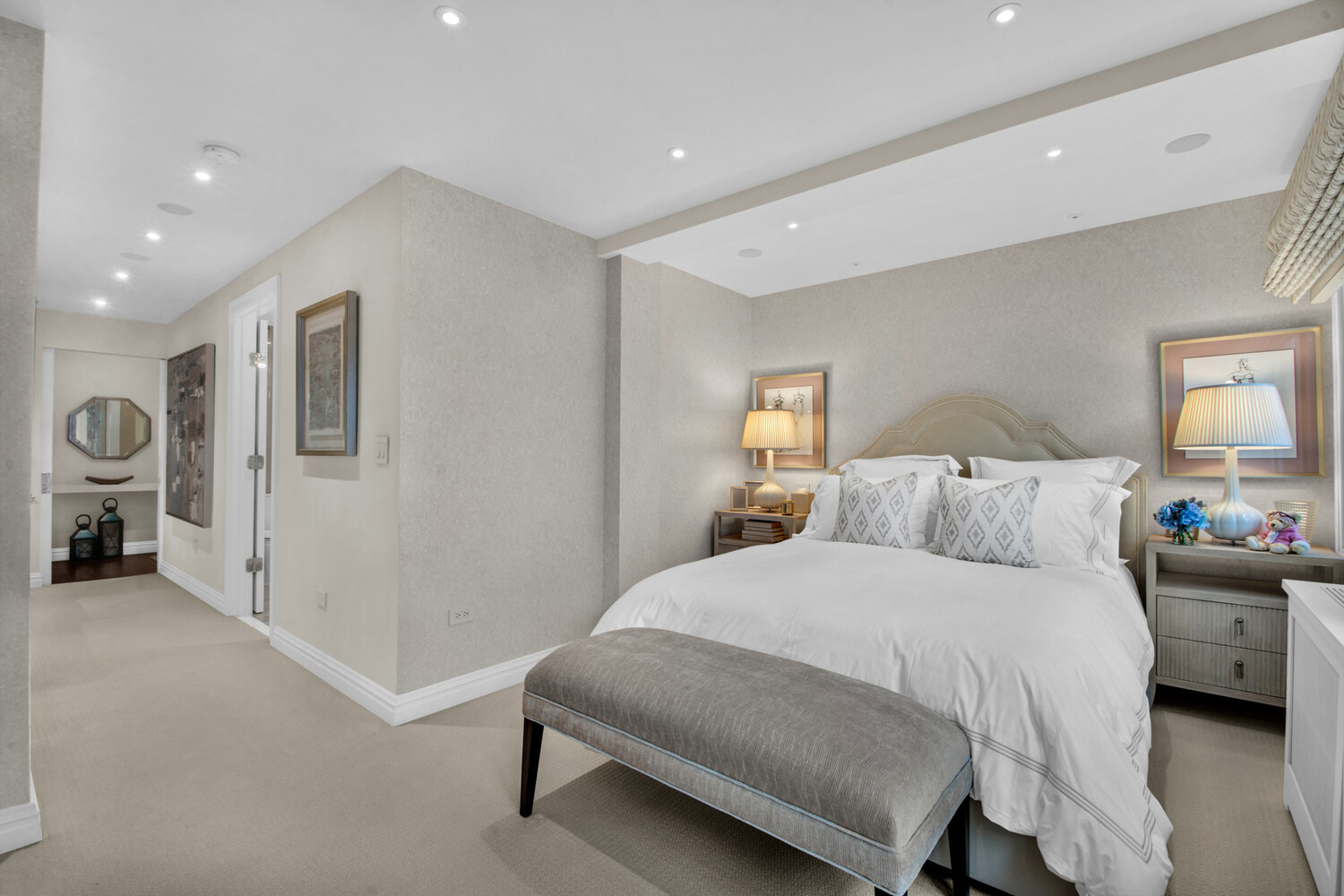 241 East 76th Street, Unit 2HI Manhattan, NY 10021 - Photo 19 of 27 a bedroom with a bed and a couch