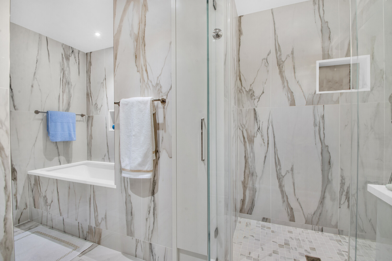 241 East 76th Street, Unit 2HI Manhattan, NY 10021 - Photo 21 of 27 a bathroom with a shower and a sink